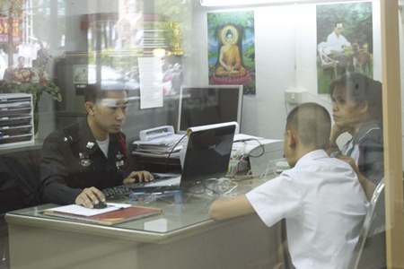 Police take a statement from the boy and his mother.